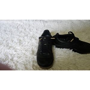 PUMA Unisex-Child Gv Special Sneaker, Black and Gold, size 5.5Y